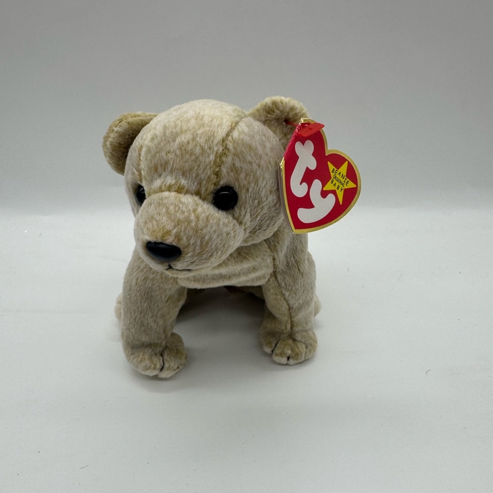 Vintage “Almond" Beanie Baby teddy bear manufactured by Ty Inc.